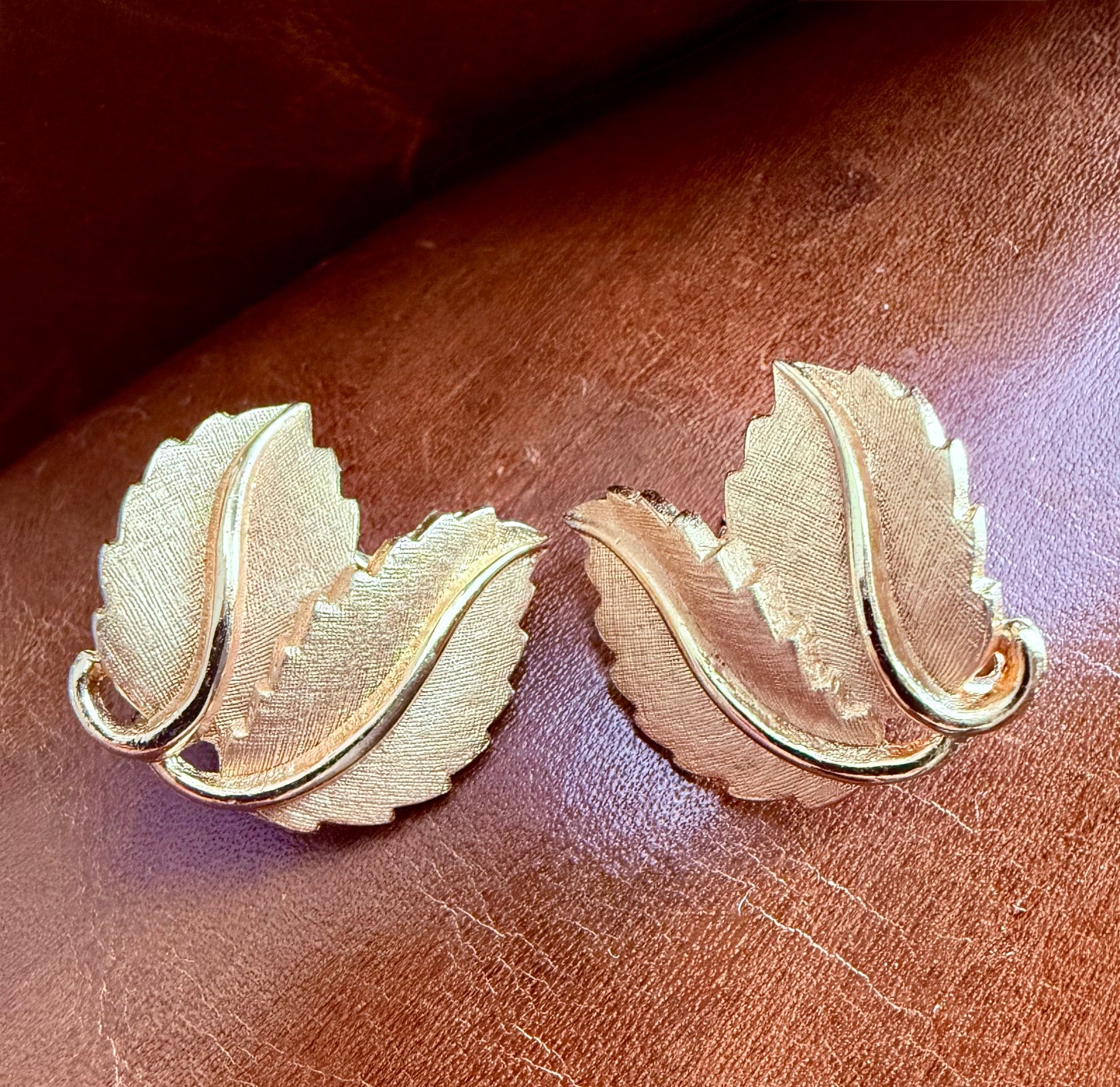 Vintage CROWN TRIFARI Clip-On Earrings in Brushed Gold Tone Double Leaf Design - Signed