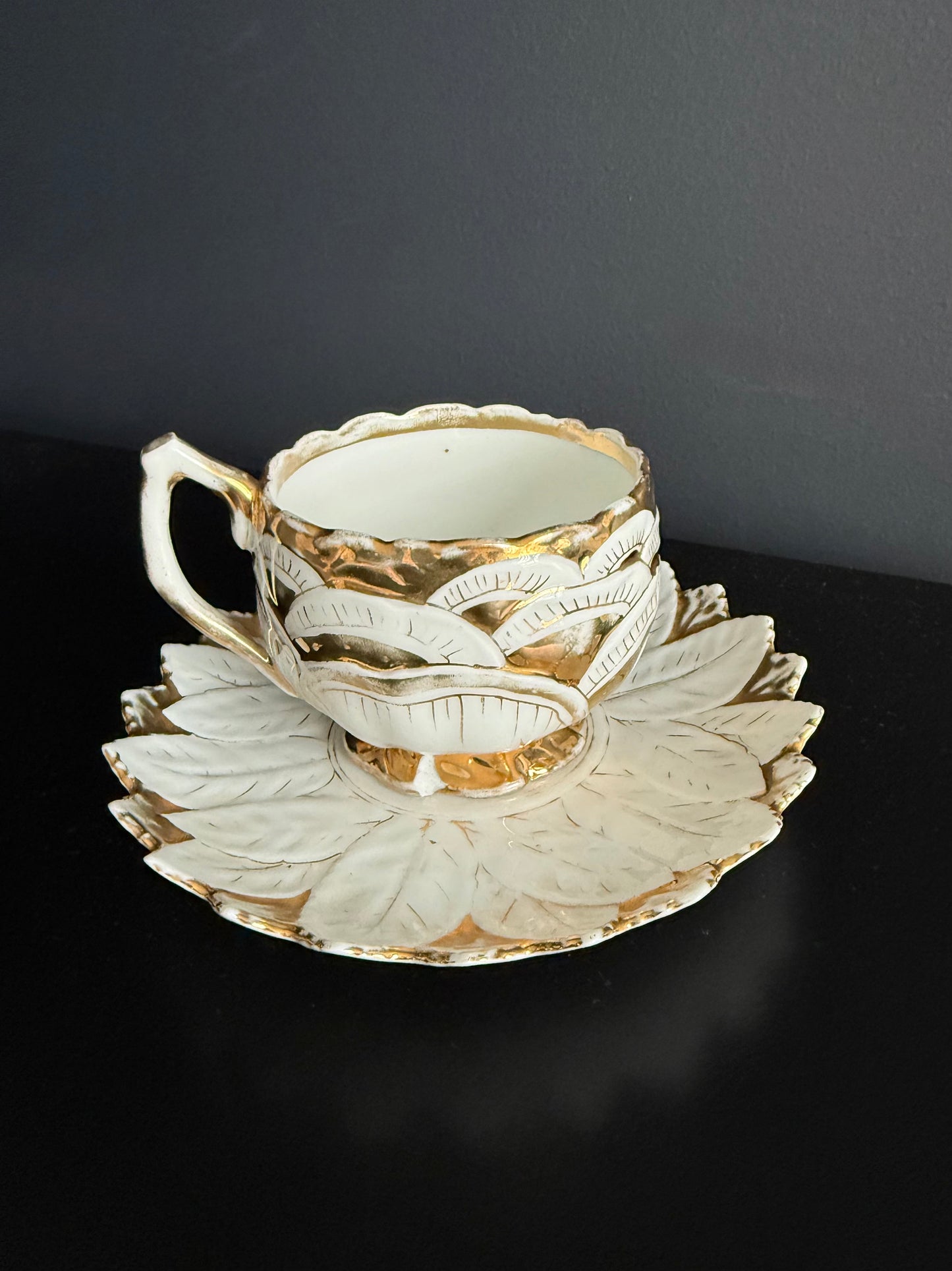 Antique White and Gold German Porcelain Tea Cup and Saucer