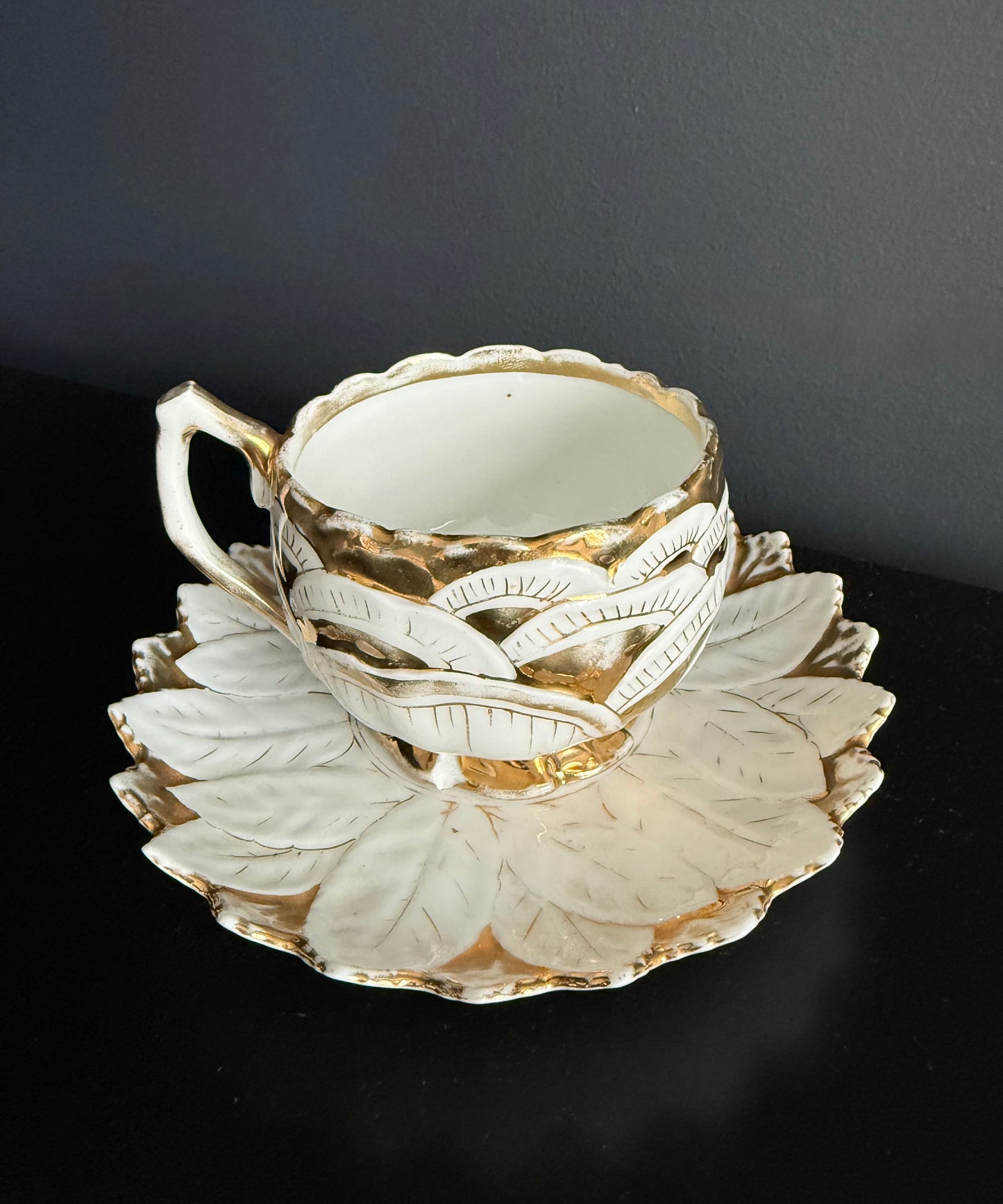 Antique White and Gold German Porcelain Tea Cup and Saucer