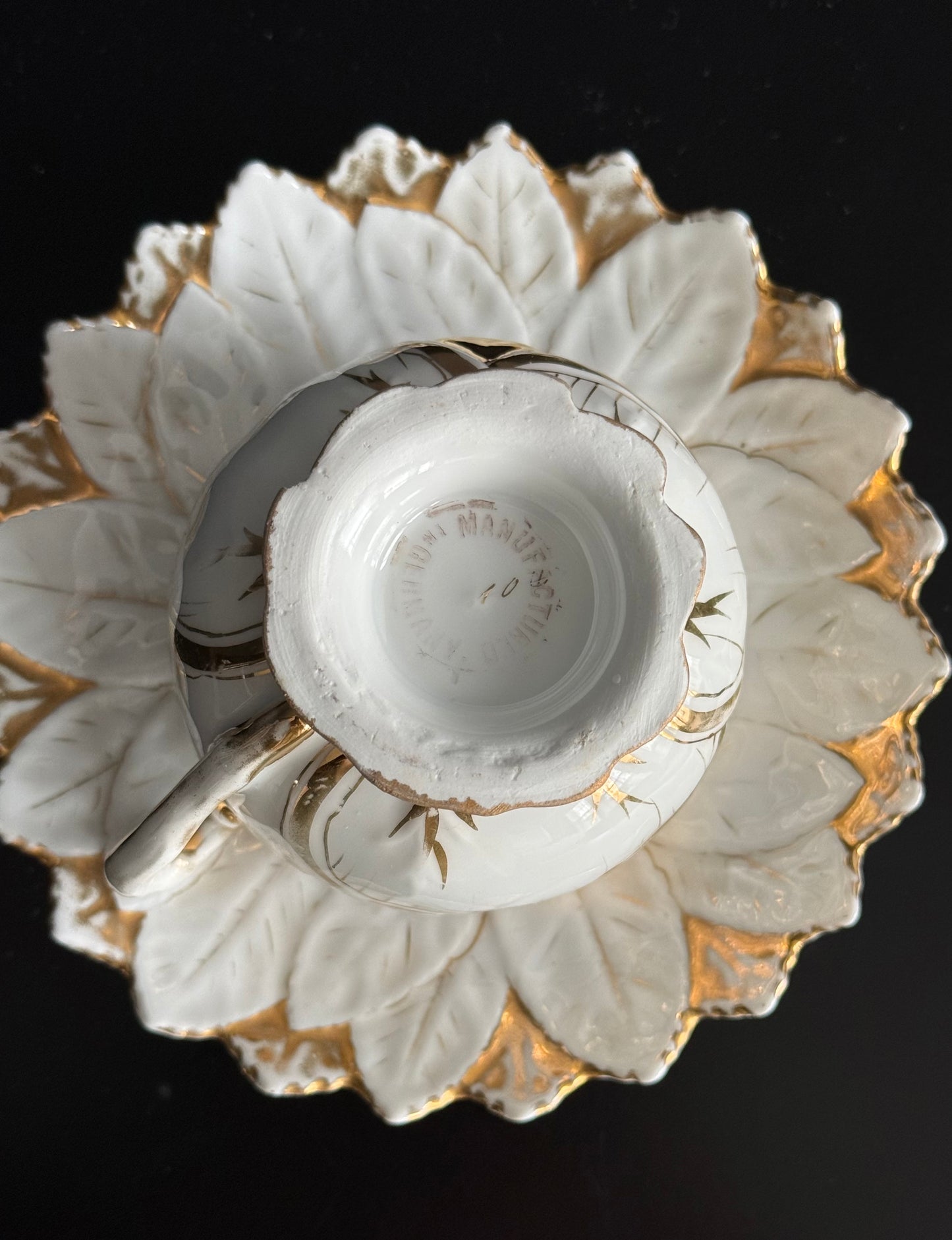 Antique White and Gold German Porcelain Tea Cup and Saucer