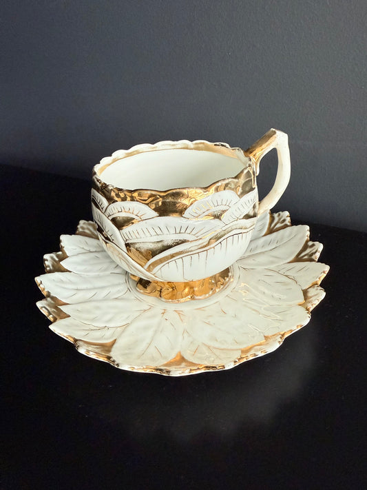 Antique White and Gold German Porcelain Tea Cup and Saucer