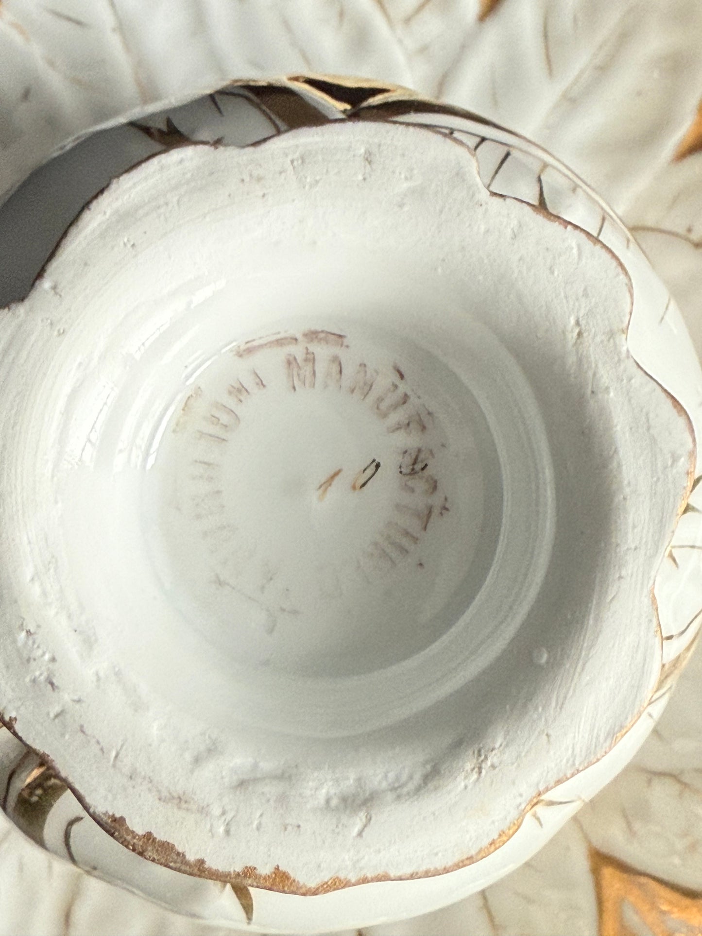 Antique White and Gold German Porcelain Tea Cup and Saucer